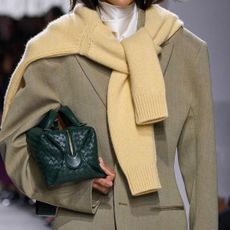 A collage of different photos from the S/S 26 Bottega Veneta show. 