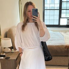 Nikki wearing an outfit from everlane's new summer collection.