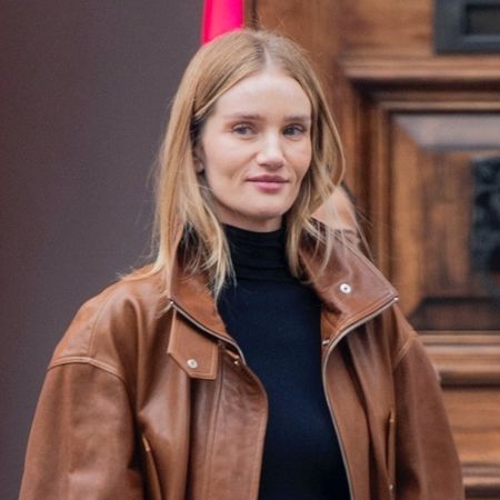 Rosie Huntington-Whiteley wearing a cognac leather jacket