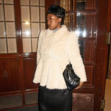 Nnenna Echem wearing a faux fur hat. 